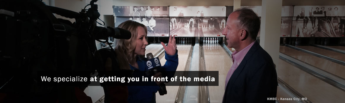 A TV journalist interviews a man in a bowling alley, emphasizing media exposure services. Background features vintage bowling photos, enhancing context.